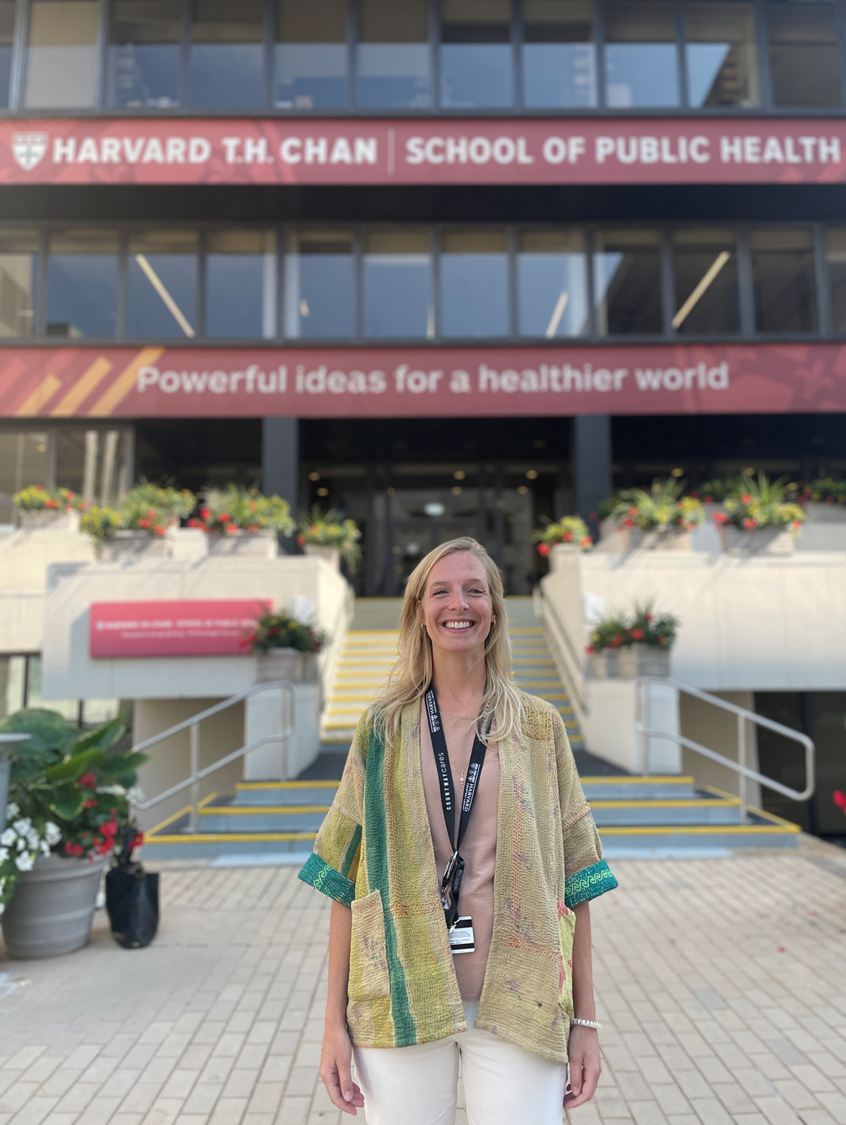 Caroline Bulstra in front of the Harvard T.H. Chan School of Public Health